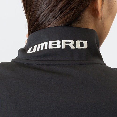 THE THIRD ウォームアップハーフジップトップ